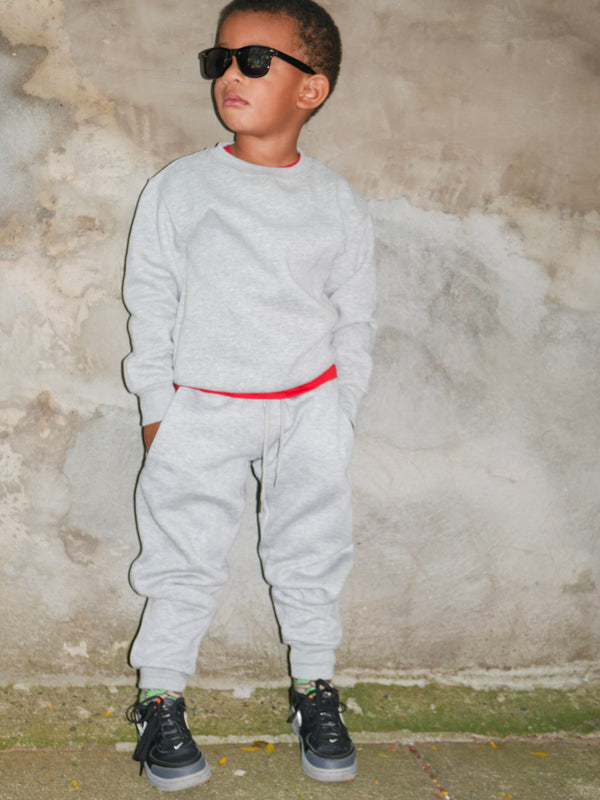 The trend towards minimalist children's clothing could signify a greater movement towards sustainability and simplicity.
